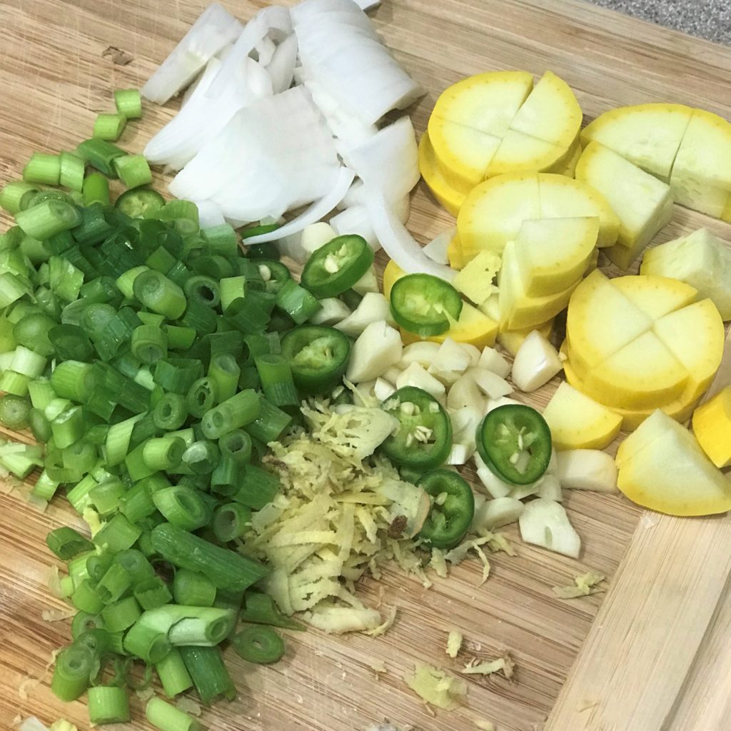 Chopped green onions, yellow squash,